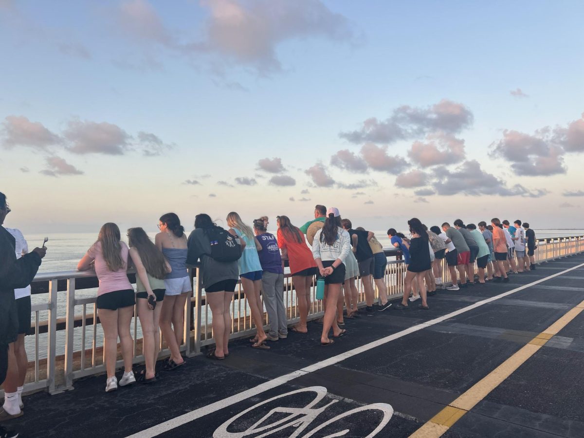 The 8th graders look over the 7 Mile Bridge in the Florida Keys. Grace Longsworth said, "The view was so pretty. The water was so clear." (Photo by Ms. Heckle)