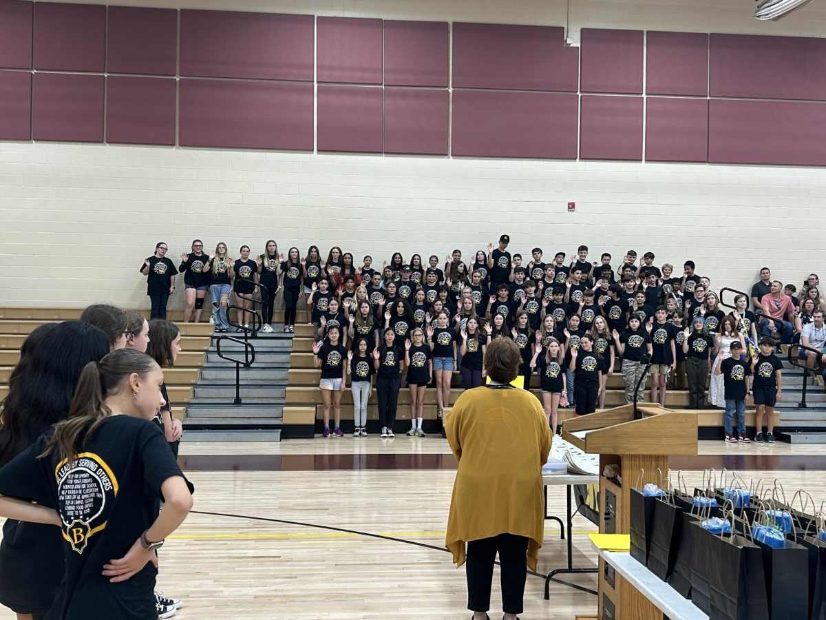 The new beta members take the pledge of national beta.  
