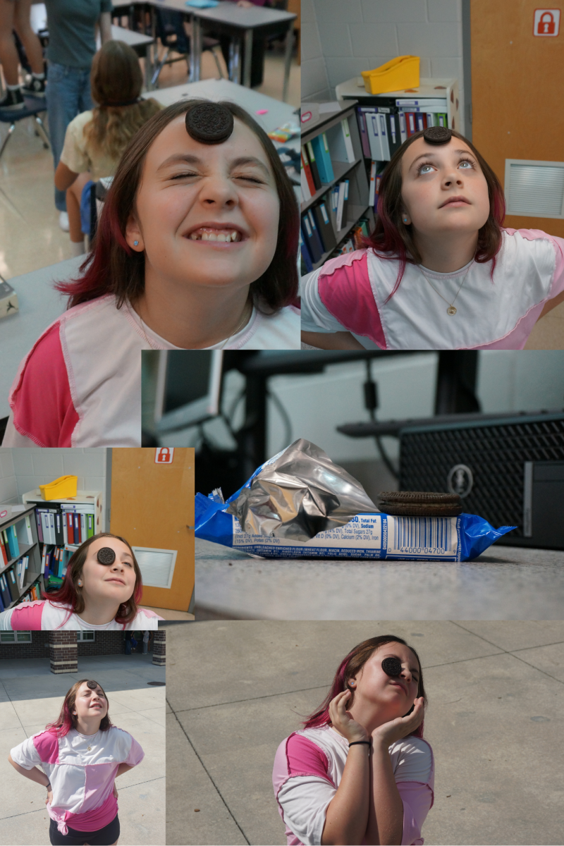 You'll have to work for your Oreo! These are photos of our own Abbigail Frail trying out the challenge. Though she doesn't really like Oreos, Abby still enjoyed the challenge. "It was very challenging but good for getting to know your friends." -Abbigail Frail