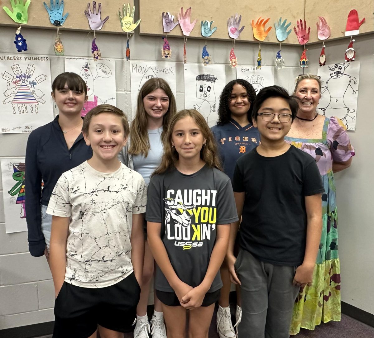 Featured above are the six students who competed in the all-state auditions, along with Ms. Swallow. They did a fabulous job, and Luke (Bottom left) Scored a perfect score on his sight reading test! "I just tried my best and I didn't even know I got perfect score until Ms. Swallow told me!" Luke told Zoe Partee