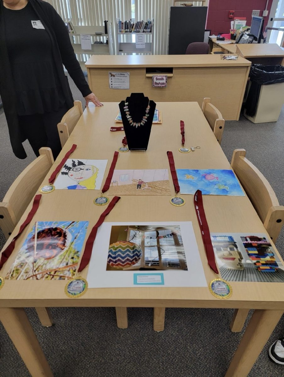 This could be your art! This picture is from the final Reflections ceremony in the Lorenzo Library. Here they announced what projects will be moving on to the county level!