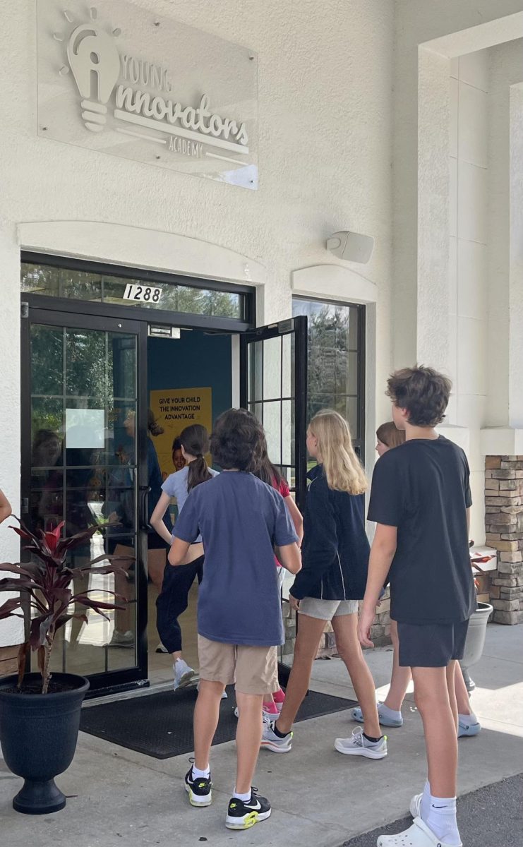 Beta Club students walk into the Young Innovators building.