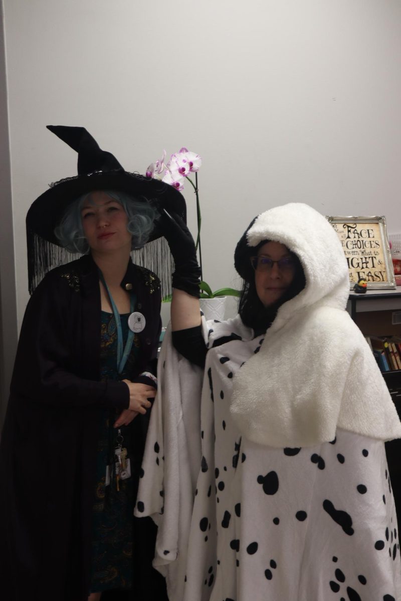 Mrs. Brady and Mrs. Campbell are dressed to scare the drugs away