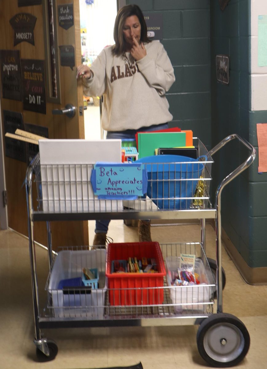 Mrs. Haddox thinks about what she wants to get.