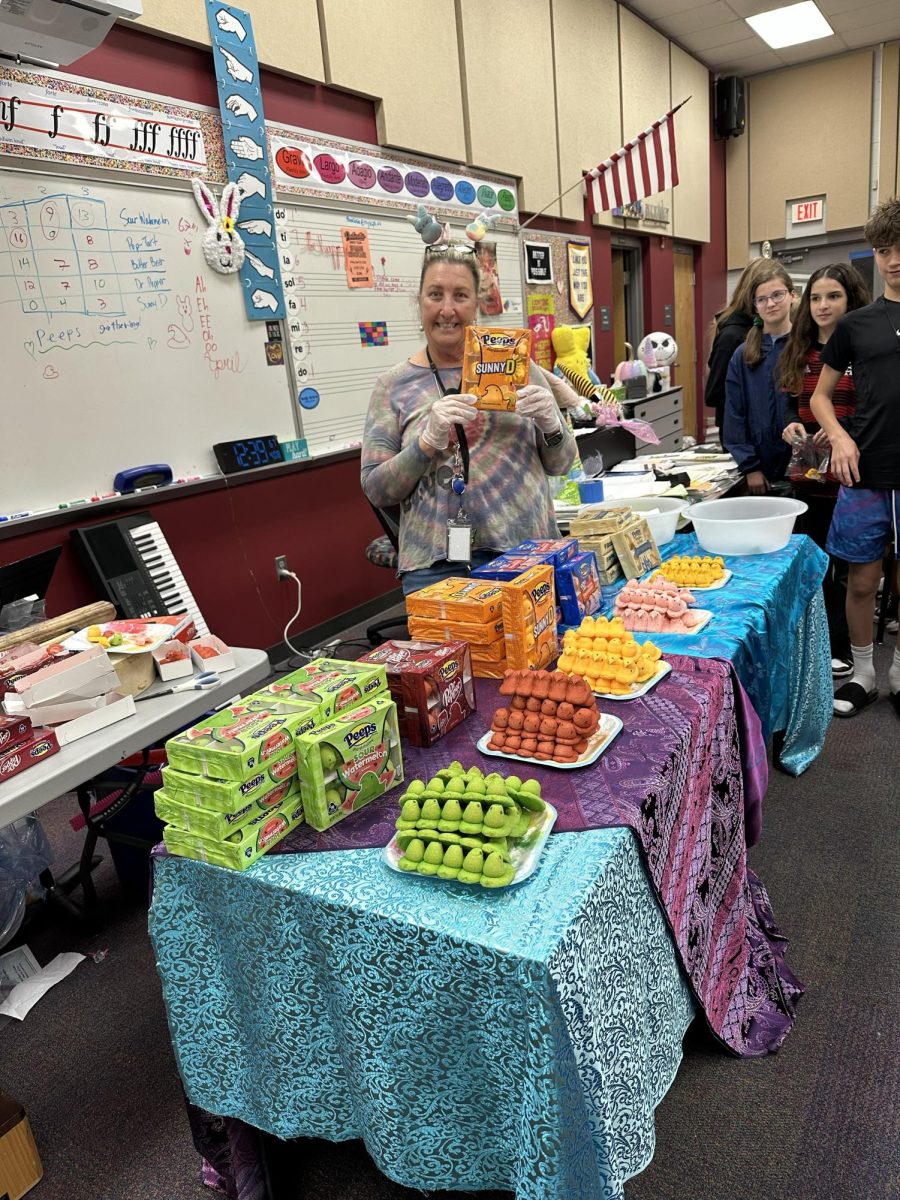 Mrs. Swallow shows off her peeps while rocking a peep headband.