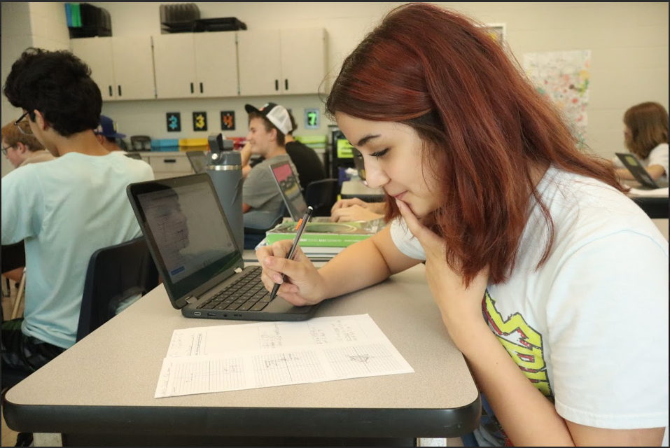 It's all adding up:                                           Math is considerably one of the most difficult subjects to master due to the amount of studying that goes into it.  Quinn Dozier (8) was working on a difficult math problem in class, not quite understanding the topic. She said, "I'm scared for the EOC but I'm feeling pretty confident because my super tough math teacher Ms. Creager helped me prepare."