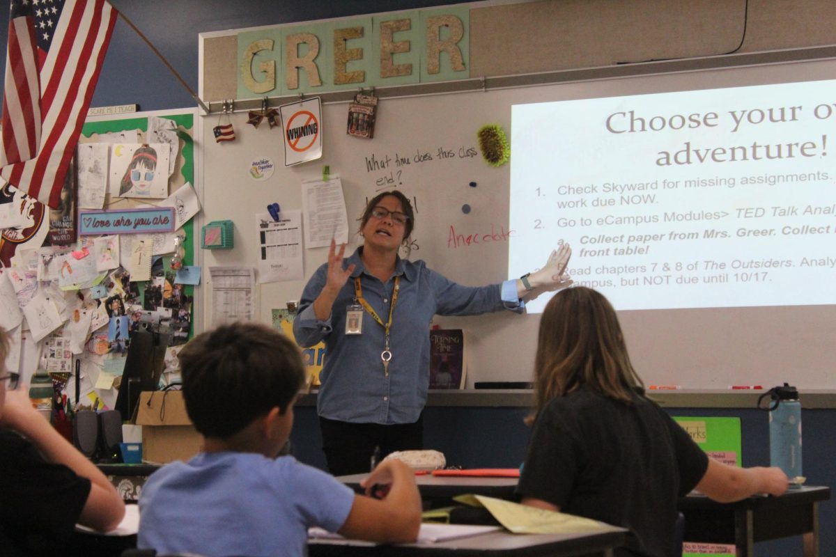 Mrs. Greer explains the lesson plan to her 5th period gifted ELA class. As the 6th and 7th grade gifted teacher, she takes all the gifted students out for gifted consultations monthly. In these meetings, students set goals for the year and check in on stress levels with students. She said "My favorite part of teaching gifted is being a part of the students creative ideas and critical thinking". She also teaches 6th grade ELA and one 7th grade ELA. Her favorite moment from the year was when her 6th grade student Grace Han won the 4H Speech Contest for the school and county levels.
