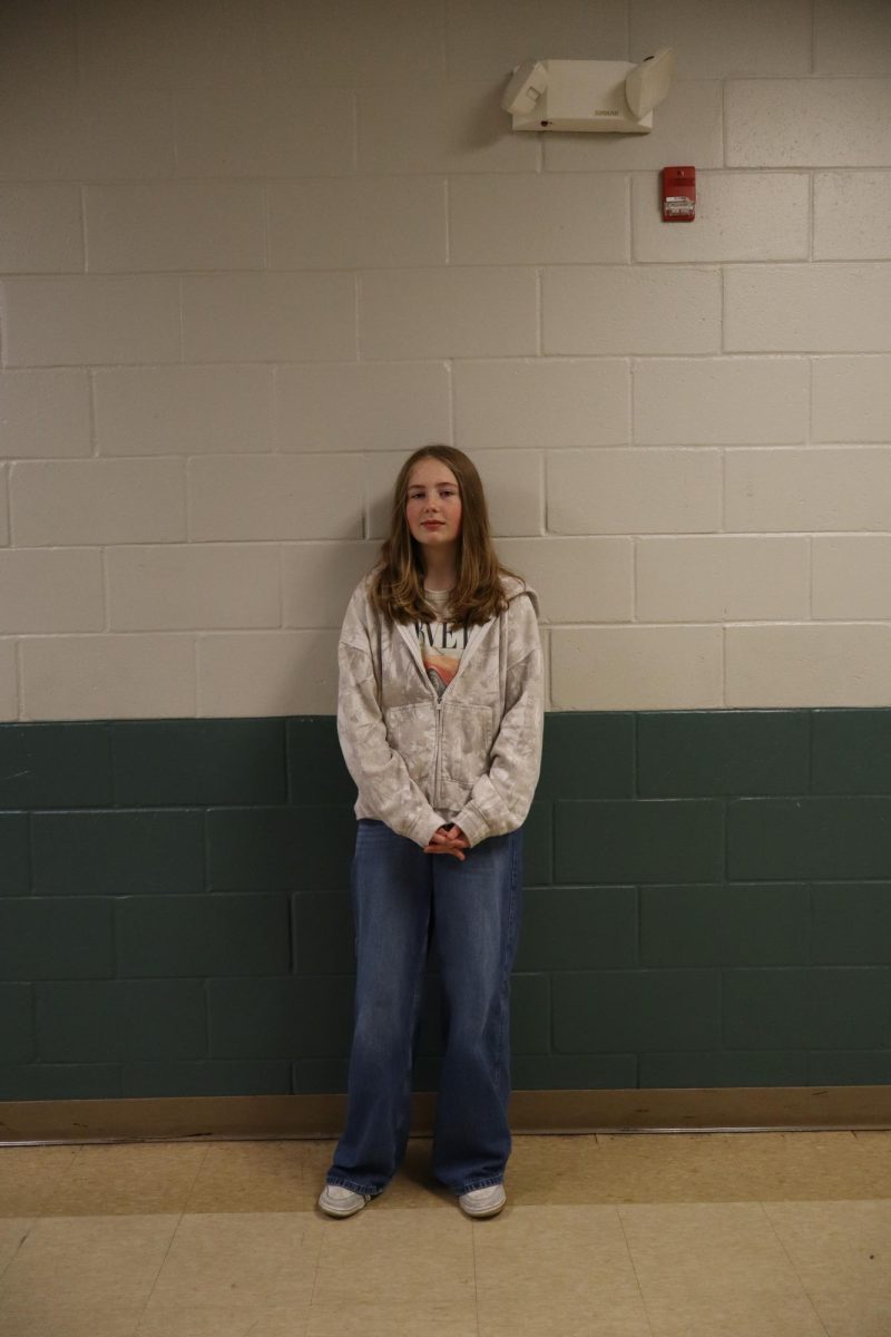 Julia Fitzgerald (7) Says, "I play basketball, I love the running and winning our games."
